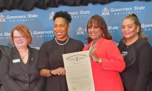 Lt. Gov. Juliana Stratton (second from left) and Rep. Debbie Meyers-Martin hold the proclamation announcing GSU’s collaboration on the stroke prevention project. GSU Provost Beverly Schneller (left) and Tonya Roberson, GSU’s Director of Program Development, look on.