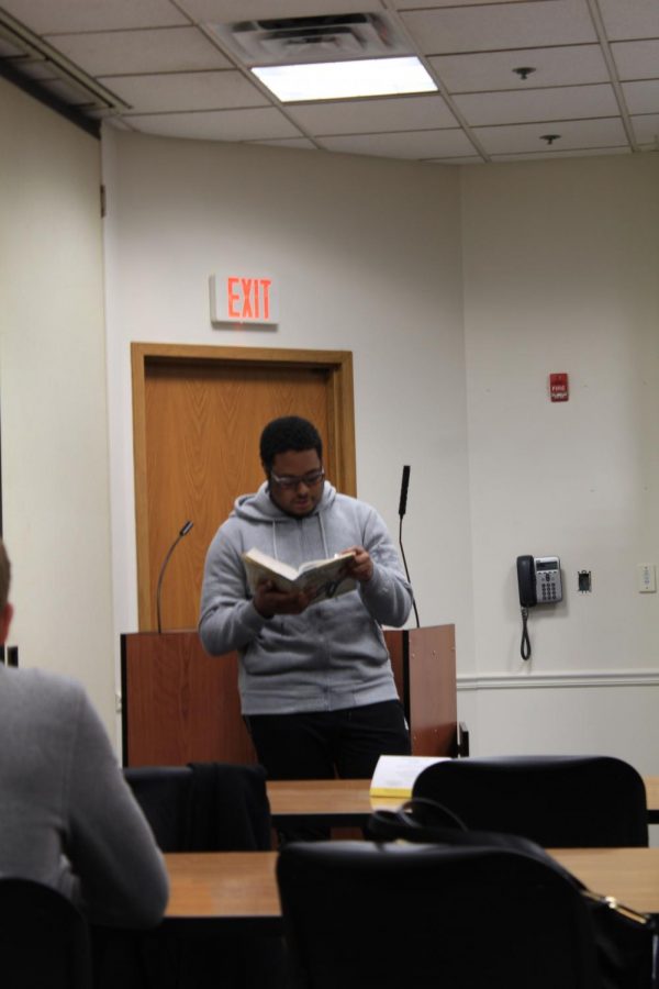 A student reads during a previous year's African American Read-In