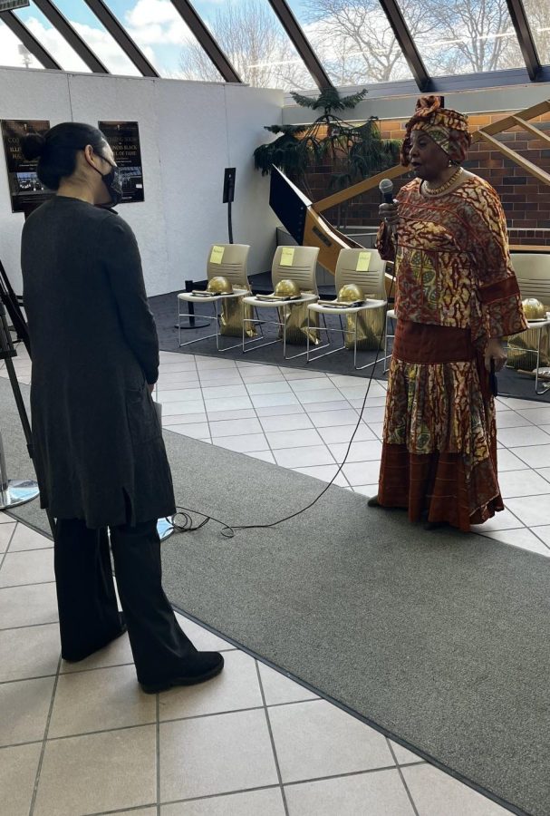 Dr. Ceola Barnes (right), founder of the Illinois Black Hall of Fame, gives an interview following the ceremony.