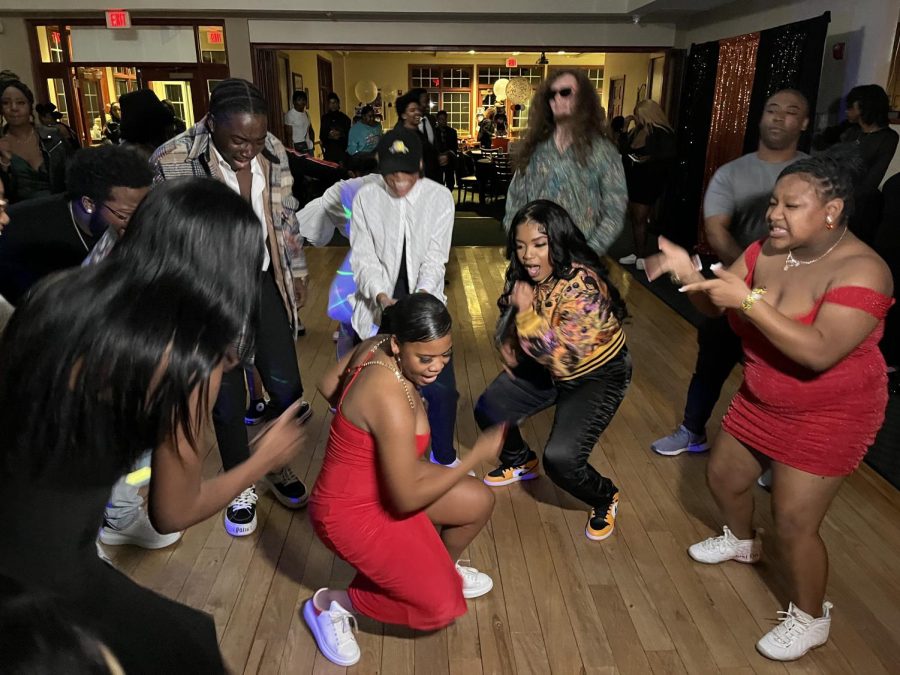 Vicki Street (center with microphone) and GSU students dance at the University Park Golf Course Clubhouse.
