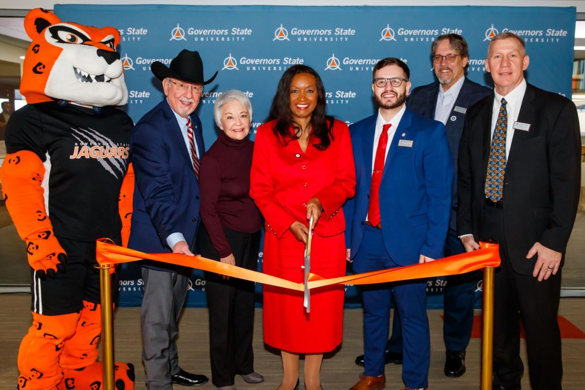 (from Left) Jax the GSU mascot, Dr. Juan Andrade, Elena Andrade, President Cheryl Green, Emmanuel Lopez, Trustee Jim Kvedaras, Vice President Paul McGuinness