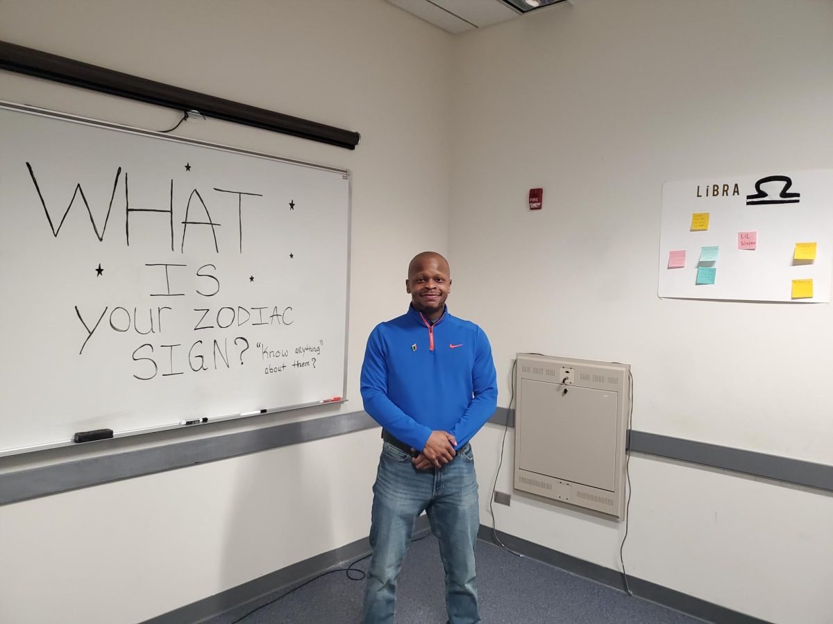 Malcolm Banks stands in front of a portion of the 'Written in the Stars' installation.