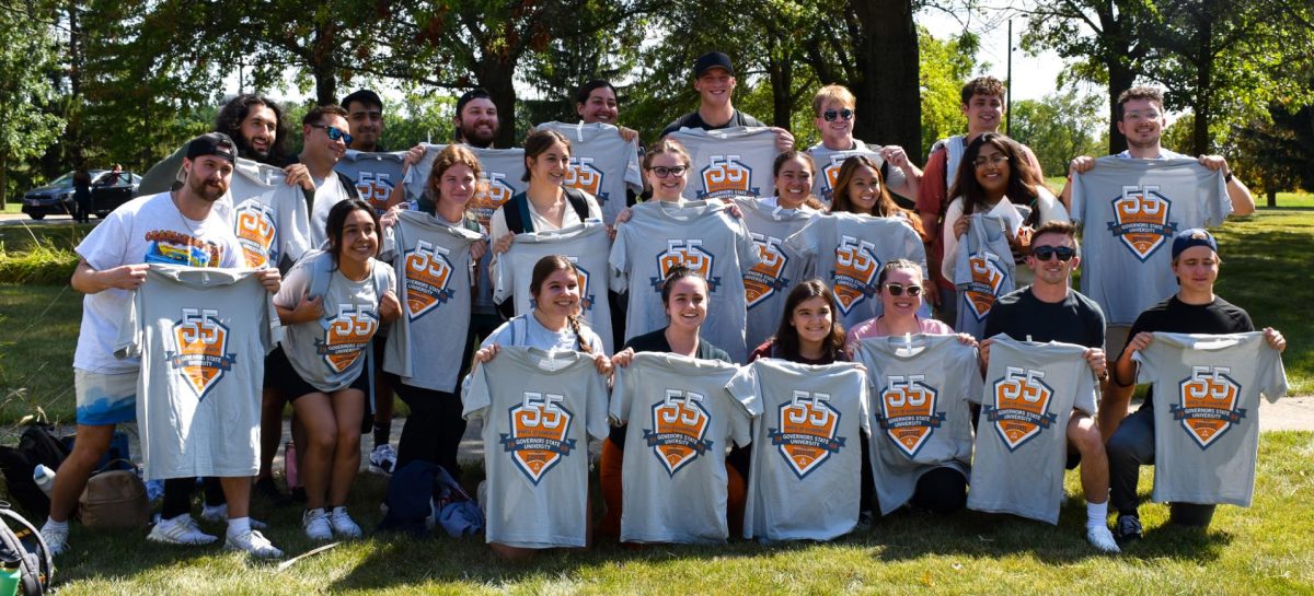 Students show off T-shirts celebrating GovState's the 55th anniversary.