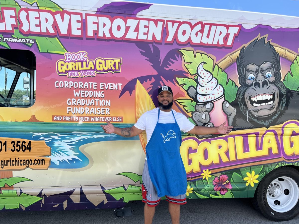 Donzell Franklin stands next to his frozen yogurt truck. (Photo provided by Franklin)