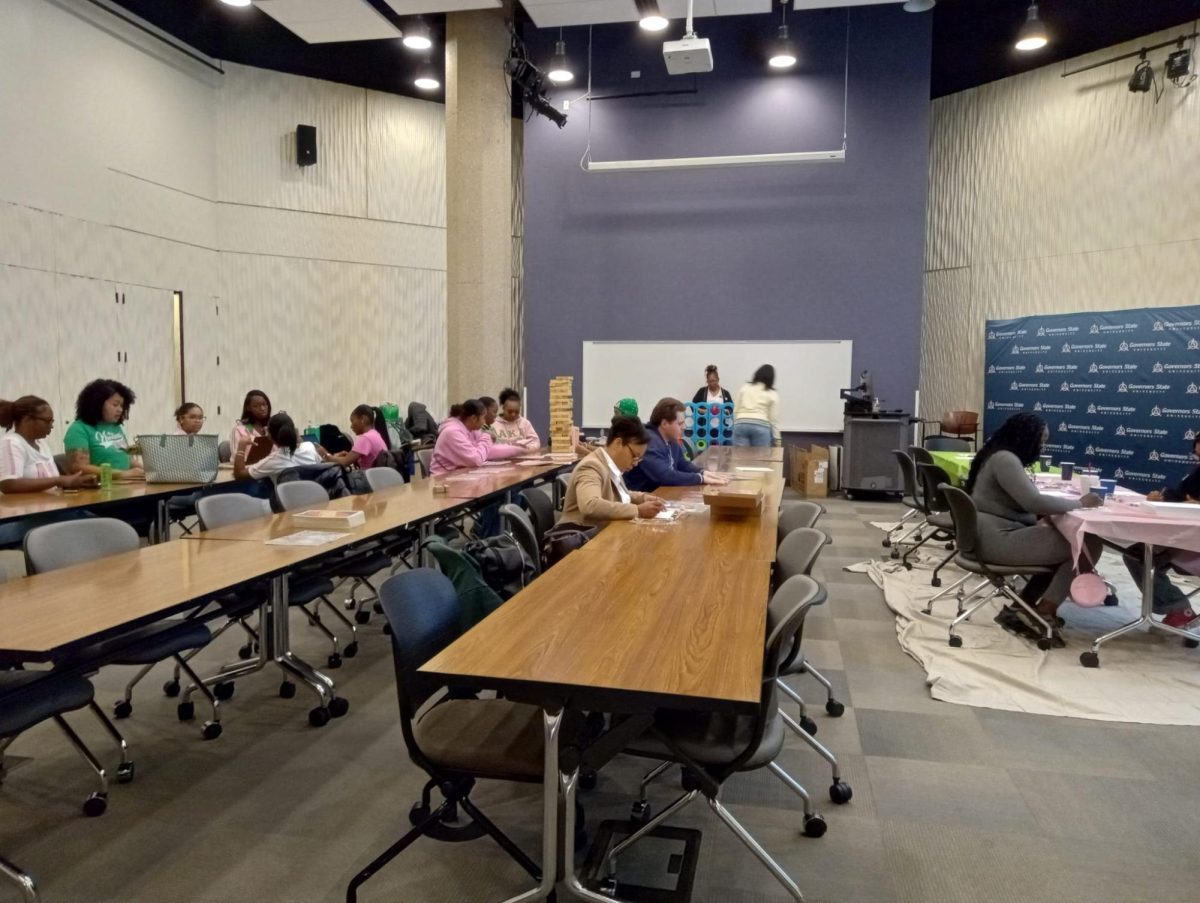 Students connect through art and activities during the Ivy Family event held in Engbretson Hall at Governors State University.