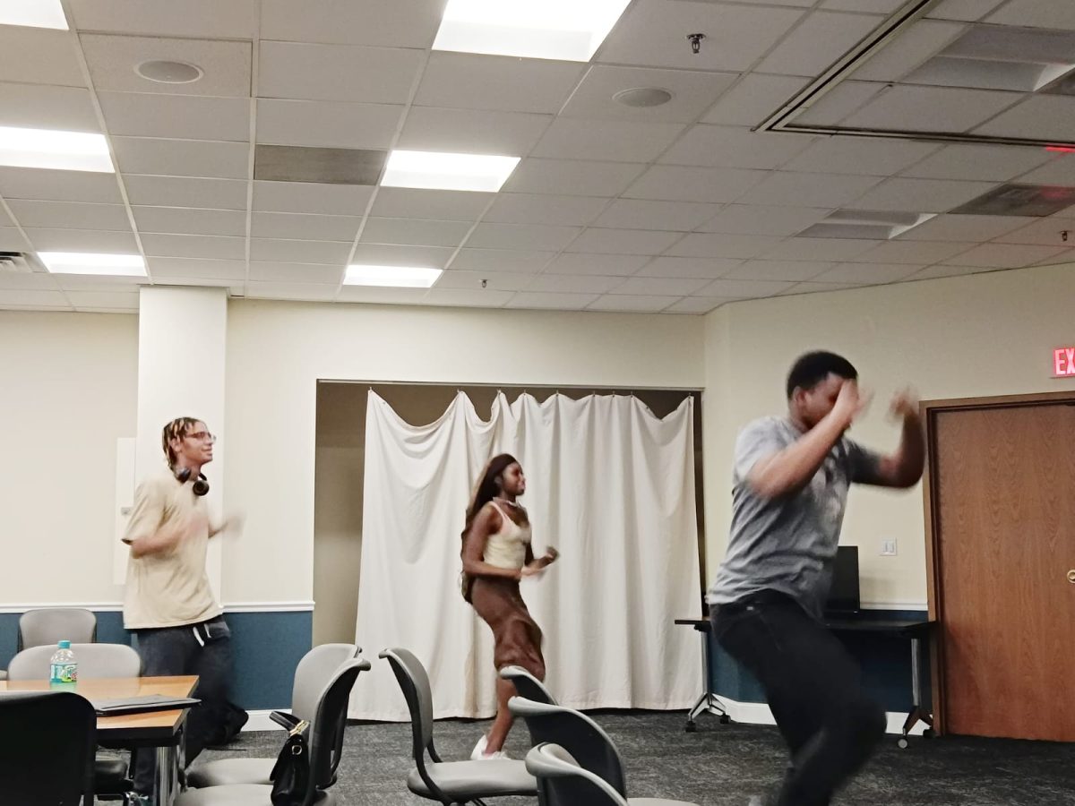 Students enjoying dancing at Just Dance Tournament at Gsu